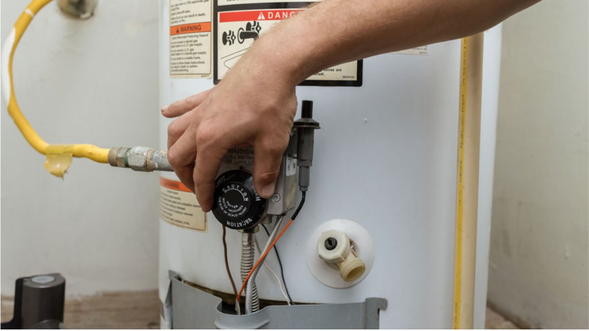 What causes too much pressure in a hot water heater?