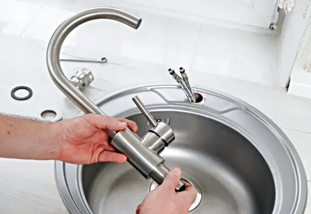 Installing a stylish and efficient new faucet in a renovated space.