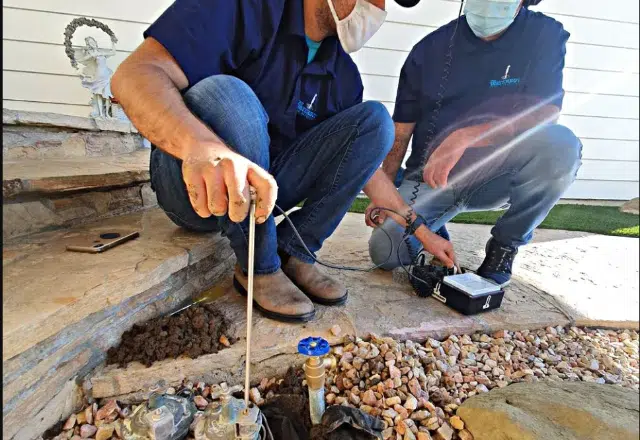 Plumbing Professionals Detecting Pipe Leaks
