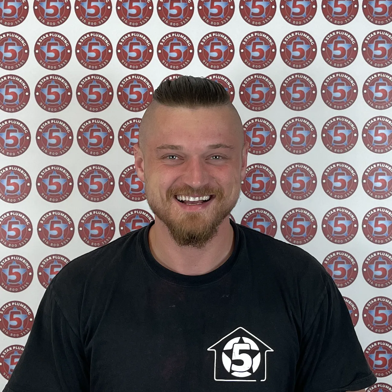 Adam -plumbing technician from 5 Star Plumbing in uniform.