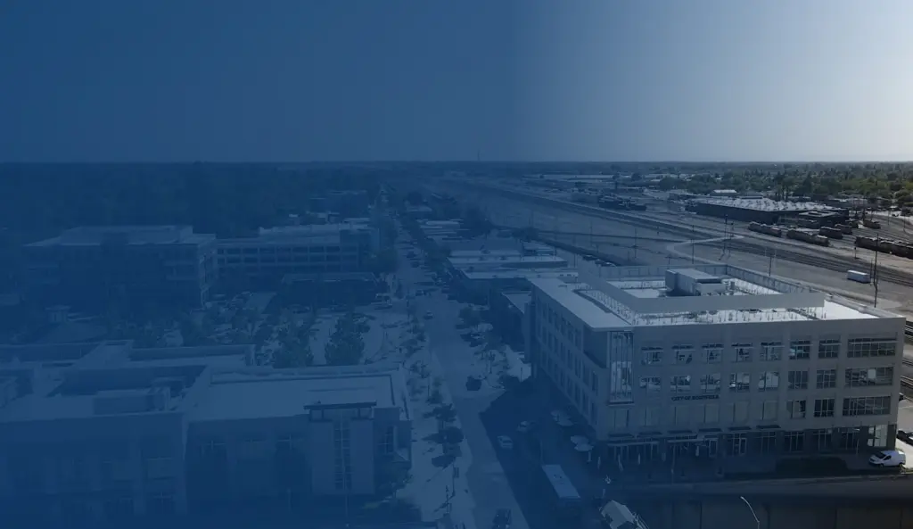 Aerial view of commercial buildings and streets in Roseville, California.